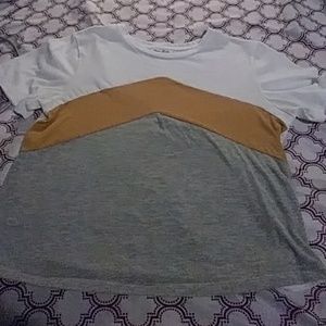 I'm selling a white shirt with yellow and gray wit